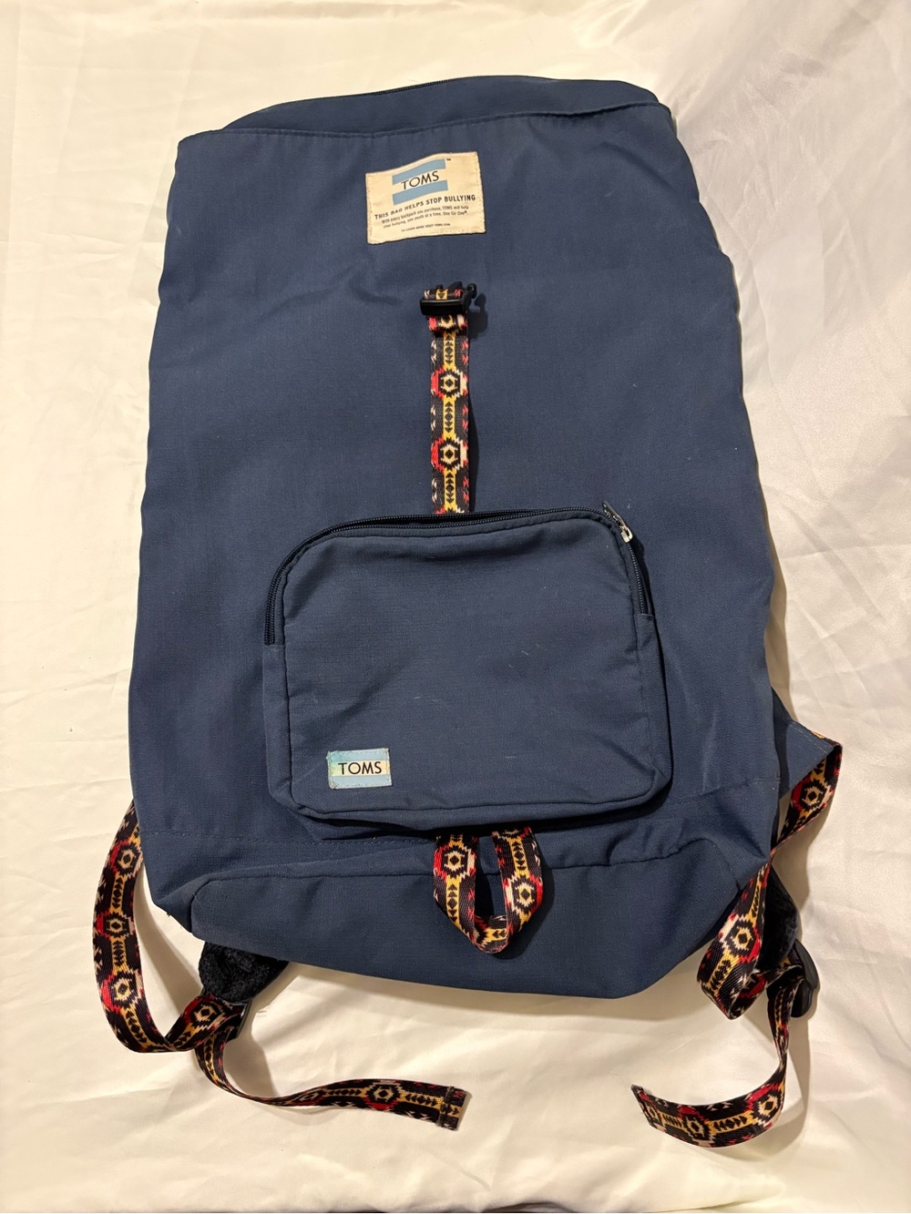 TOMS Navy Backpack with Patterned Accent Straps Anti-Bullying Mission Statement